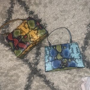 2 small snake print satchels